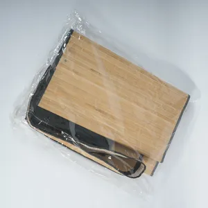 Bamboo woven foldable storage basket detail showing natural texture and black fabric edge reinforcement.