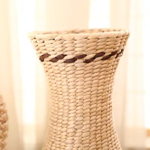 Woven straw vase detail, rustic wicker flower basket, dry flower arrangement decor container