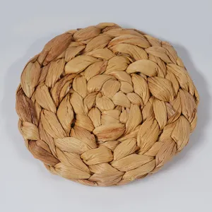 Handcrafted water hyacinth woven placemat detail showing natural texture and neat edge finishing.