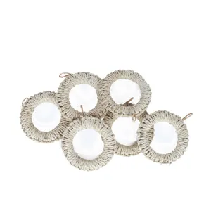 Handcrafted natural straw woven trivet set, round corn leaf table mat for hot dishes.