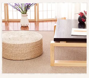 Detailed view of natural woven straw round tatami cushion, perfect for zen meditation and floor tea.