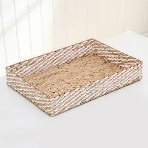 Woven storage basket detail showing natural straw and white weave texture for home organization.