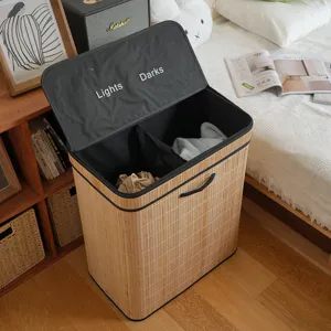 Detailed view of bamboo laundry hamper with double compartment and lid for sorting clothes.