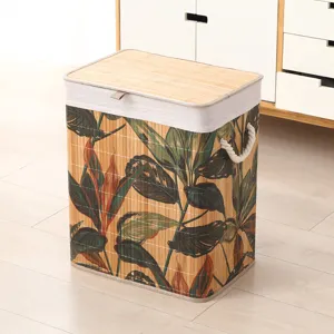 Cesto de ropa plegable de bambú con tapa y asas, ideal para el almacenamiento en el hogar.