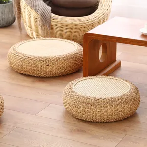 Handcrafted round straw meditation cushion tatami floor mat detail view for home tea room.