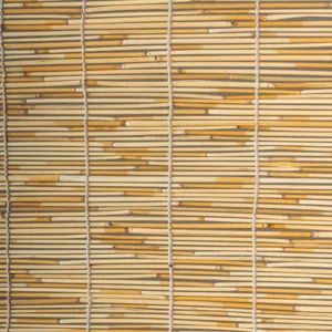 Close-up detail of natural reed curtain showing woven texture and sturdy string binding.