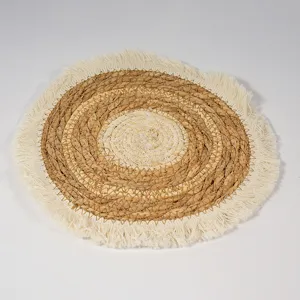 Round straw woven placemat with fringe, natural fiber table mat for dining room kitchen decor.
