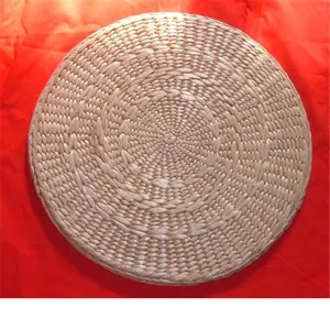 Handcrafted round woven straw meditation mat for yoga, tatami and cozy home decor use.