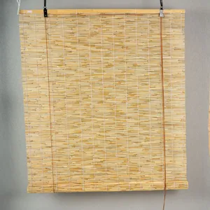 Natural reed roller blind for window shading, exterior installation and home decor.