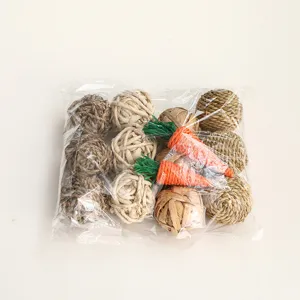 Pet chewing grass balls and carrot toys set for small animals, parrots, and hamsters.