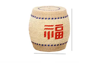 Handcrafted straw meditation stool tatami pouf zen cushion detail view with blessing symbol.