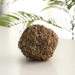 Natural grass woven chew ball toy for pets, birds and hamsters dental care and playing.