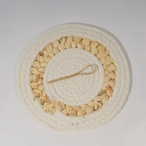 Handmade straw corn husk placemat detail, thick heat resistant braided table mat coaster.