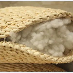 Handcrafted straw woven floor cushion tatami seating mat with soft white interior filling.