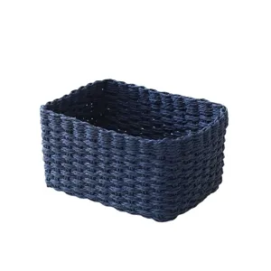 Dark blue woven storage basket for home desktop organization, stylish and practical.