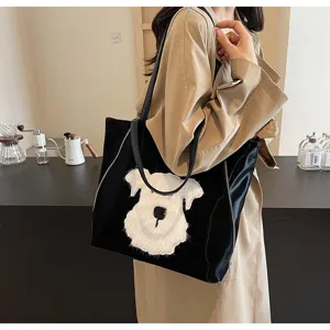 Lässige schwarze Schultertasche mit niedlichem flauschigen Hund-Plüsch für Damen und Alltag