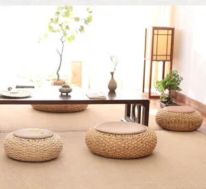 Round straw woven tatami meditation floor cushion, thickened rattan pouf for home balcony.