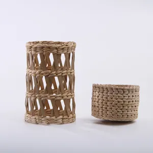 Natural straw woven cup sleeve vase decor handmade rustic home decor detail shot
