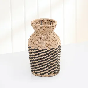 Handmade straw woven vase for home decor, retro desktop small mouth braided dried flower basket.