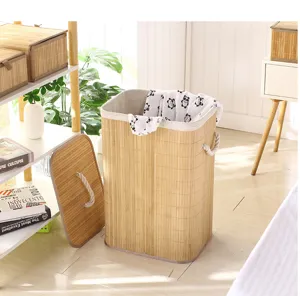Cesta de ropa sucia de bambú con tapa y asas para el almacenamiento y orden del hogar.