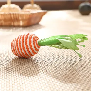 Detailed close-up of the woven carrot craft ornament, highlighting natural texture.