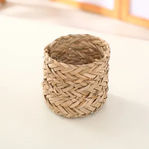Natural straw woven flower pot cover, handmade plant storage basket for home decor and desktop organization.