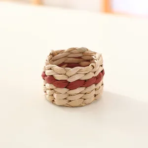 Handcrafted natural straw woven napkin ring for elegant table setting and home dining decor.