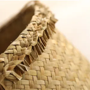 Handwoven straw basket rim detail, natural bamboo rattan texture for home decor storage.