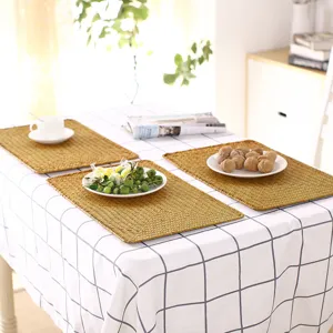 Natural straw woven placemat for dining table, heat resistant kitchen mat, table decor.