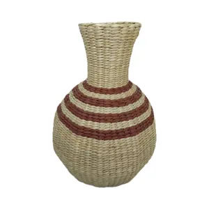 Handmade woven seagrass vase with striped belly, natural desktop flower decoration.