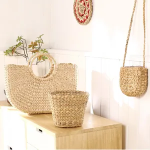Handmade straw woven tote bag and storage basket set, natural material for daily home use.