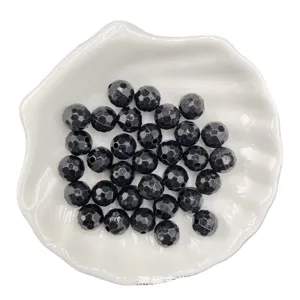 Perles de football facettées en acrylique noir lot pour bracelet DIY collier accessoires.