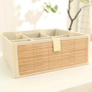 Detailed view of the foldable fabric storage box with multi-compartments for home organization.
