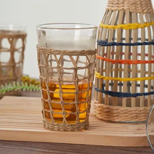 Straw woven glass cup with natural rattan sleeve boho drinkware for kitchen and hotel