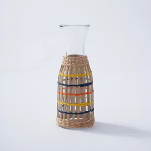 Straw woven glass vase decorative handmade rattan glass cup cover for home office decor style.