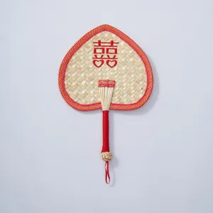 Handmade woven straw fan detail, Chinese style heart shaped fan with red fabric and double