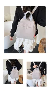 Multi-functional casual backpack in light grey, stylish and minimalist design for daily commuting.