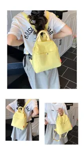 Casual yellow canvas backpack for women, versatile commuting daypack with multiple pockets.