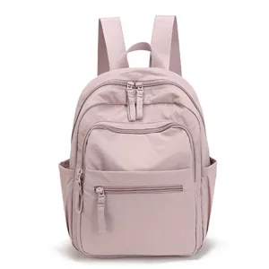 Casual pink nylon backpack for women, lightweight travel daypack with multiple pockets.