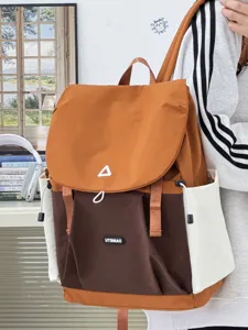 Casual two-tone canvas backpack for women, stylish daily student bookbag and travel daypack.