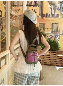 Outdoor lightweight mini backpack shoulder bag with contrast color design and cute tennis pendant.
