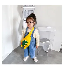 Joli sac à bandoulière dinosaure jaune pour enfants, sac de poitrine en toile pour voyage.