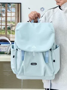 Light blue casual backpack for women, stylish student school bag and lightweight travel daypack.