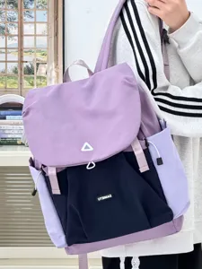 Casual purple backpack for women, lightweight travel daypack with multiple pockets and straps.