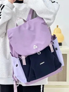 Casual colorblock backpack for women, lightweight nylon school bag for daily commute.
