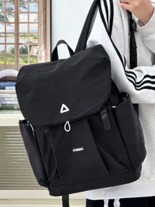 Japanese style casual black backpack for women, lightweight travel school bag with front pocket.