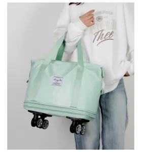 Light green travel duffel bag with universal wheels large capacity waterproof expandable overnight bag.