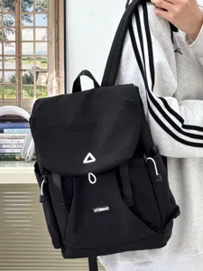 Casual black canvas backpack for women, daily commute travel daypack with front flap and pockets.