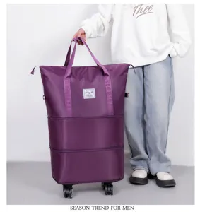 Expandable rolling travel bag detail showing large capacity and smooth universal wheels.