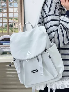Casual grey backpack for women, stylish Japanese design daypack for daily commute and travel use.